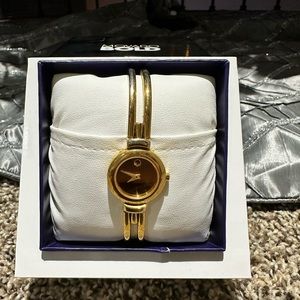 Movado Gold Face Watch